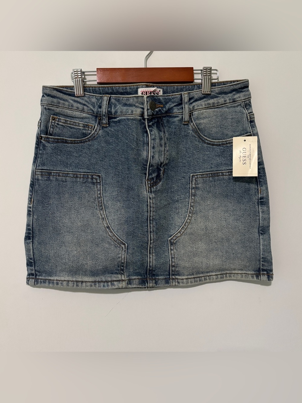 GUESS Distressed Light Blue Denim Mini Skirt. Stretchy